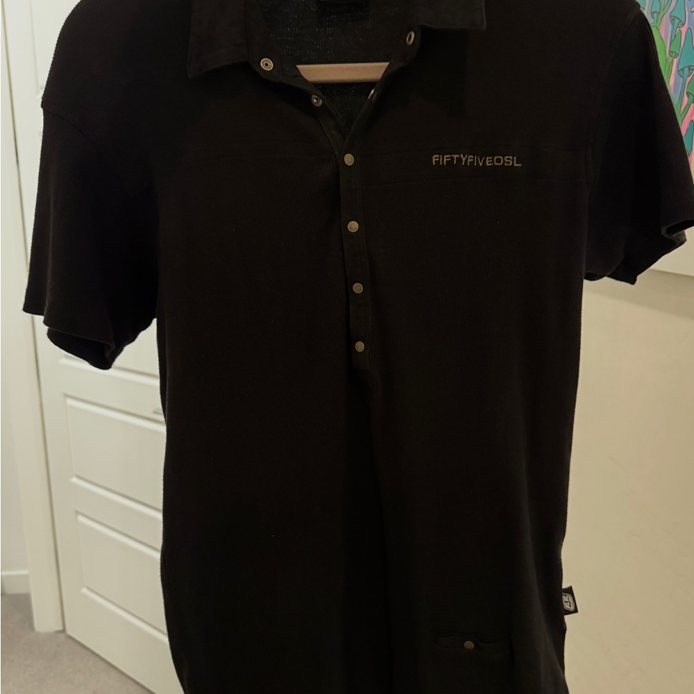 Black Diesel Polo Shirt with Soft Fabric and Collar